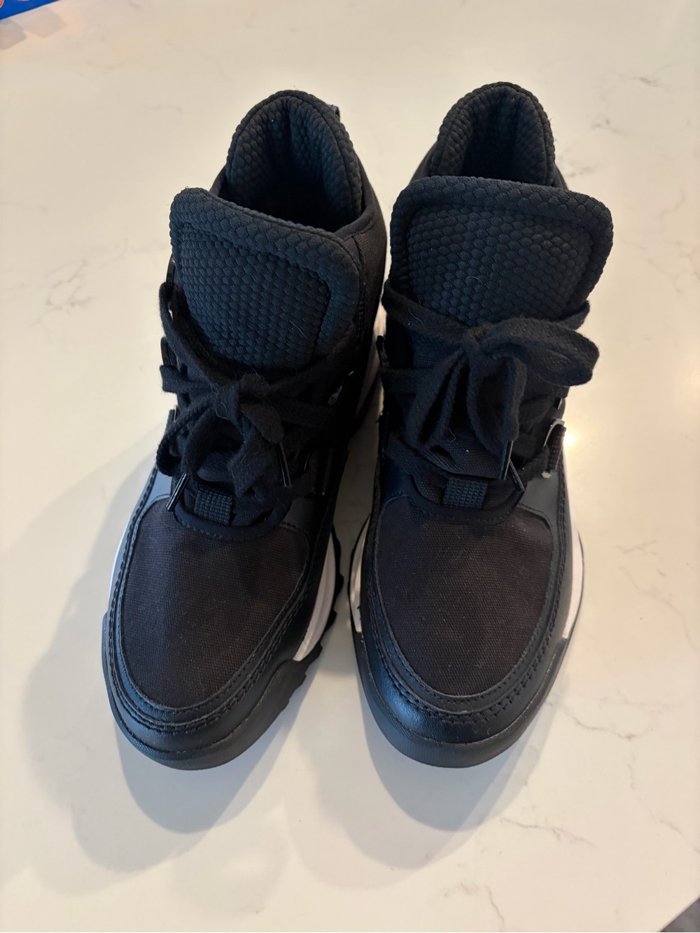 Sorel Black High-Top Sneakers with White Sole Accent